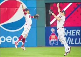  ?? Photo / AP ?? Home run hitter Francisco Lindor (left) and Jay Bruce celebrate the Indians win.