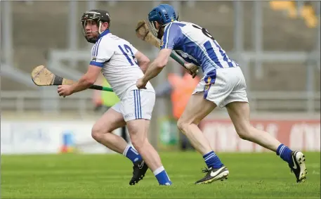  ??  ?? George Bee O’Brien of St Patrick’s in action against Neal Farrell of Ballyboden St Enda’s.