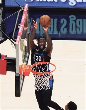  ?? Brynn Anderson / Associated Press ?? Knicks forward Julius Randle shoots the ball against the Hawks during Game 3 of their first-round playoff series Friday.