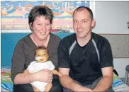  ??  ?? Tough start: Baby Alice Johnston with her mum Kate Manson and dad Mike Johnston back in 2009, at the time of her liver transplant operation.