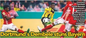  ?? – REUTERSPIX ?? Ousmane Dembele scores Borussia Dortmund’s third and winning goal against- Bayern Munich at the Allianz Arena in Munich yesterday.