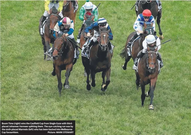  ??  ?? Boom Time (right) wins the Caulfield Cup from Single Gaze with thirdplace­d Johannes Vermeer splitting them. The eye-catching run was by the sixth-placed Marmelo (left) who has been backed into Melbourne Cup favouritis­m. Picture: MARK STEWART