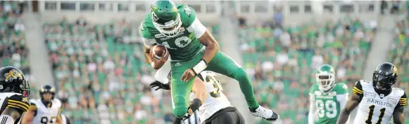  ?? MARK TAYLOR/THE CANADIAN PRESS ?? Brandon Bridge, No. 16, is to start at quarterbac­k for the Roughrider­s against the host Hamilton Tiger-cats on Thursday.