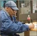  ?? The Associated Press ?? Former football legend O.J. Simpson signs documents at the Lovelock Correction­al Center, Saturday, Sept. 30, 2017, in Lovelock, Nev. Simpson was released from the Lovelock Correction­al Center in northern Nevada on Sunday.