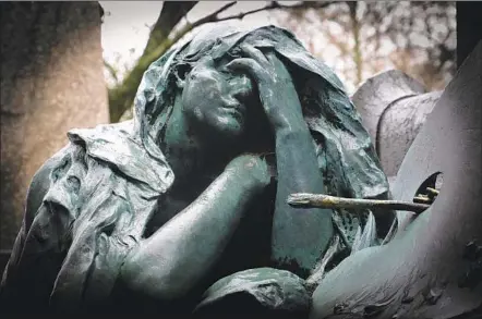  ??  ?? MARIUS MERCIÉ sculpted this bronze female figure of “La Douleur” (Grief) on the tomb of artist Paul Baudry at Père-Lachaise.
