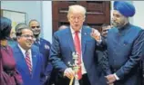  ?? REUTERS ?? President Donald Trump marks Diwali at the White House as India’s ambassador to the US Navtej Sarna (right) looks on.