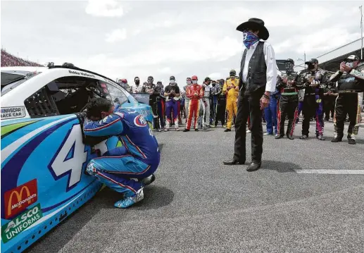  ?? Chris Graythen / Getty Images ?? Bubba Wallace was emotional following acts of solidarity by fellow NASCAR drivers as well as affirming words from team owner Richard Petty.