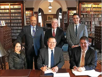  ?? SUBMITTED PHOTO ?? Front row: Nan Sato of Shimin Law; Shikun Gao of Shimin Law; Mike Grigalonis, COO at the Chester County Economic Developmen­t Council. Back row: Terence Farrell, Chester County Commission­er; Roger Huggins, partner at the West Chester law firm of...