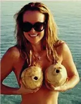  ??  ?? JANUARY 6: ‘DO YOU think these are a lovely bunch of coconuts?’ asked Amanda when she posted a suggestive snap on Instagram from her holiday.