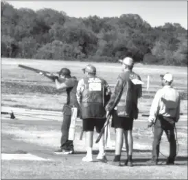  ?? Courtesy ?? Pictured above, Cody Nelson takes aim in the Skeet Shoot-off at USAYESS Junior Clay Target National Championsh­ips in San Antonio, TX. Behind Nelson from left is Zach Smith, Jacob Uphoff and the referee.