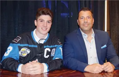  ?? DAVID CROMPTON/Penticton Herald ?? Forward Massimo Rizzo was introduced as the Penticton Vees’ captain for 2018-19, while president, GM and head coach Fred Harbinson has signed an extension through the 2023-24 season.