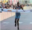  ?? Picture: WERNER HILLS ?? MORE TO COME: Daniel Simiu Ebenyo from Kenya wins the men’s race in the Absa Run Your City 10km event in Gqeberha yesterday