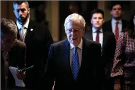  ?? ERIN SCHAFF — THE NEW YORK TIMES ?? Senate Majority Leader Mitch McConnell, R-Ky., leaves the Senate floor Thursday after a speech in which he denounced House Democrats for impeaching President Donald Trump.