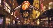  ?? LEON NEAL — AFP VIA GETTY IMAGES ?? The Rolling Stones will open A new flAgship store next month on London’s CArnABy Street.