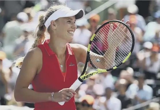  ??  ?? 2 Caroline Wozniacki shows her delight after winning matchpoint against Karolina Pliskova in last night’s semifinal at the Miami Open.