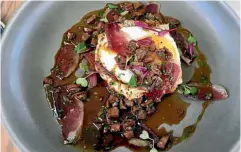  ??  ?? The duck prosciutto with duck heart sauce, potato rosti and free-range fried egg.