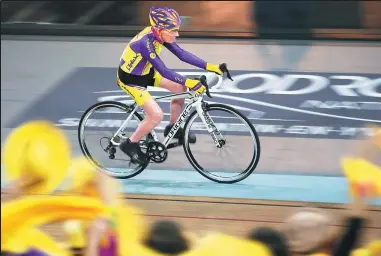  ?? FRANCOIS MORI / AP ?? Robert Marchand rides on his way to 92 laps at the National Velodrome outside Paris on Wednesday.