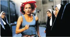  ?? X- FILME CREATIVE POOL ?? Franka Potente makes three frantic scrambles through Berlin to save her boyfriend from a crime boss in Run Lola Run (1998).