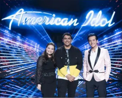  ?? ABC/ ERIC MCCANDLESS ?? Madison VanDenburg of Cohoes represents the American Idol Top Three with Alejandro Aranda, center, and winner Laine Hardy, right.