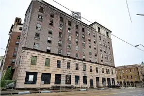  ?? Staff photo by Hunt Mercier ?? ■ The Hotel Grim is seen Friday in downtown Texarkana, Texas. Asbestos abatement is beginning on the building and is expected to be complete by the end of May 2020.