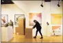  ?? Tyler Sizemore / Hearst Connecticu­t Media ?? Co-owner Lindsay Ebanks moves boxes at the current location of Cavalier Ebanks Gallery.