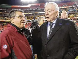  ?? MARK TENALLY / AP 2015 ?? Washington owner Daniel Snyder, with Dallas Cowboys owner Jerry Jones, announced Monday it is dropping “Redskins” and Indian head logo, bowing to pressure from sponsors and decades of criticism that they are offensive to Native Americans.