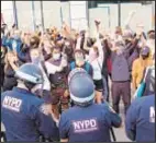  ??  ?? Protesters take over the roadway of the Manhattan Bridge in Brooklyn last summer.