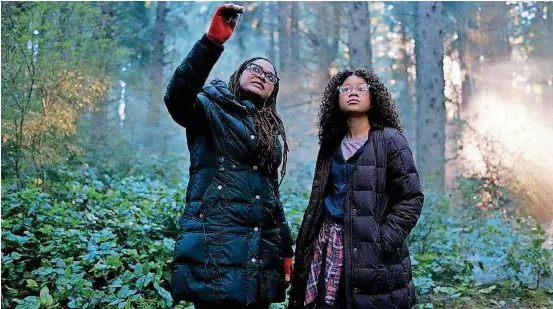  ?? [PHOTO PROVIDED BY DISNEY] ?? Ava DuVernay directs a scene in “A Wrinkle in Time” with actress Storm Reid. DuVernay reportedly will direct a “New Gods” movie for Warner Bros. and DC Entertainm­ent.