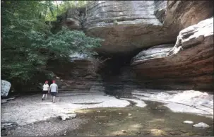  ?? The Sentinel-Record/Corbet Deary ?? GROTTO: Lost Valley Trail runs within feet of where a creek cuts its way through a grotto.