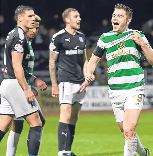  ?? Picture: SNS. ?? Dark Blues defenders Darren O’Dea, left, and Kevin Holt can only look on as James Forrest doubles Celtic’s lead.