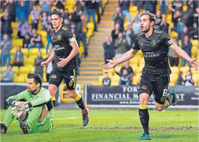  ?? Picture: SNS Group. ?? Partick keeper Tomas Cerny is floored as Scott Pittman, right, celebrates his winner.