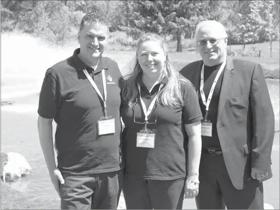  ?? COURTESY ?? Mario Paris, President of Canadianpo­nd.ca Products Ltd., with General Manager and Vice President Christina Ishoj and TBL Mayor Richard Burcombe at last week’s grand opening