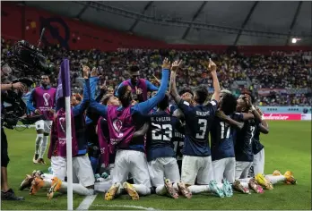  ?? NATACHA PISARENKO — THE ASSOCIATED PRESS ?? Ecuador’s Enner Valencia celebrates with his teammates after scoring his side’s first goal during the World Cup group A match between Netherland­s and Ecuador on Friday.