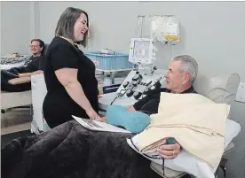  ?? TAMARA BOTTING METROLAND ?? Hamilton resident Joe Connors, right, gave his 600th platelet donation at the Hamilton blood donor clinic on June 8. Because platelet donations can be done every 14 days, Connors has gotten to know the staff and fellow regular donors.