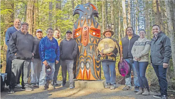  ?? CVRD / MALAHAT NATION ?? Cowichan Valley Regional District chair Jon Lefebure, left, Malahat councillor­s Matt Harry, George Harry and Vince Harry, master carver Moy Sutherland Jr., student Troy Harry, cultural drummers Wes Edwards and Jeff Edwards, Malahat lands director...