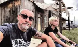  ?? Photograph: Serge Svetnoy/AFP/Getty ?? Serge Svetnoy, left, takes a selfie with Halyna Hutchins on the set of the film Rust in Santa Fe, New Mexico.