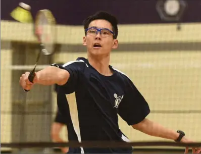  ?? PETER LEE, RECORD STAFF ?? Joseph Lu of SJAM returns a shot against Thomas Dent of WCI in the senior boys’ singles championsh­ip.