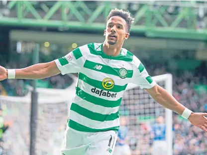  ?? Picture: PA. ?? Celtic’s Scott Sinclair celebrates his third goal against St Johnstone on Sunday.