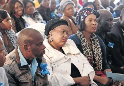  ?? /ANTONIO MUCHAVE ?? Kedibone Mashigo, centre with cream jacket, the mother of Shaun, has accused Palabora Mining Company of failing to fulfil its promise of carrying the funeral costs.