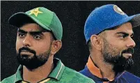  ?? ?? PAKISTAN captain Babar Azam, left, and his former Indian counterpar­t Virat Kohli pictured before the start of the ICC men’s Twenty20 World Cup. | AFP