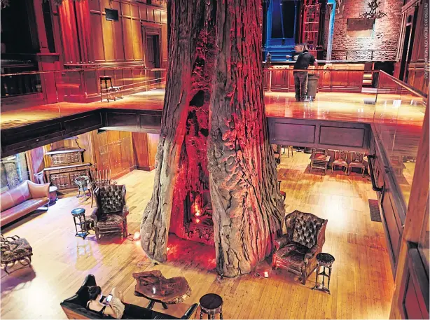  ??  ?? A three-storey replica of a coastal redwood dominates the atrium of Clifton’s Cafeteria, a historic venue soon to reopen in downtown Los Angeles.