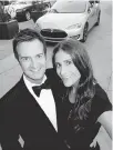  ??  ?? Autoform dealer Mike Wood drove Rachel Lloyd to the Gift of Time gala in a Tesla sedan but sold it over the phone en route.