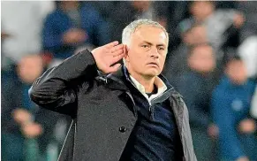  ?? AP ?? Manchester United manager Jose Mourinho cups a hand to his ear in a gesture to Juventus fans after United’s dramatic 2-1 win.