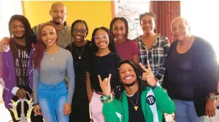  ?? ?? Micaela Cunningham joins her parents, siblings and grandmothe­r for a photo. The Bloom Trail High School student’s parents are educators and encouraged her to start earning college credits during the pandemic.