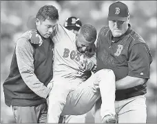  ?? Getty Images ?? OUCH: Eduardo Nunez gets carried off the field after injuring his knee in the first inning.