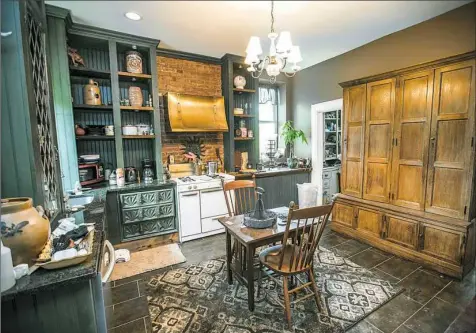  ?? Andrew Rush/Post-Gazette photos ?? The kitchen of Tim Denham and Rick Astle’s home on the North Side.