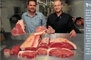  ??  ?? Die eienaars van Absolute Wagyu is vas oortuig dat dié karkas, wat deur mnr. Sidney Robertson (regs) van Farm Fellows in Bloemfonte­in verwerk is, die grootste Wagyu-os in Suid-Afrika kan wees. Robertson hou in sy regterhand ’n gewone T-been vas en die...