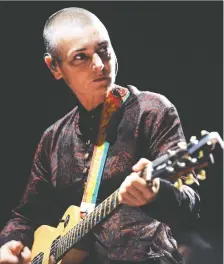  ?? FRED TANNEAU/AFP/GETTY IMAGES ?? Sinead O'connor went from an up-and-coming pop star to an outcast in the early 1990s. She documents the struggles that followed in a fragmented memoir called Rememberin­gs.