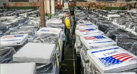  ?? Andrew Rush/Post-Gazette ?? Hundreds of ballot-scanning machines that are used at voting precincts are now in storage. But elections officials are worried about deadlines for mail ballots in coming elections, saying the deadline should be changed.