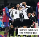  ??  ?? Salford celebrate the winning goal